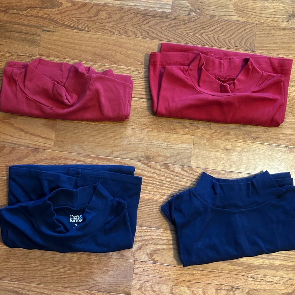 4 mock t neck women’s plus sized shirts.  2 red and 2 navy blue.